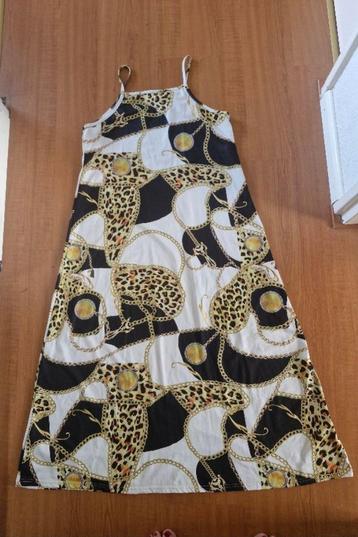 Witte met goud en zwarte gebloemde jurk maat L/XL beschikbaar voor biedingen