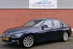 BMW 3-serie 316i Executive schuifdak. clima. cruise. navi, Auto's, 1360 kg, 4 cilinders, Blauw, Leder en Stof
