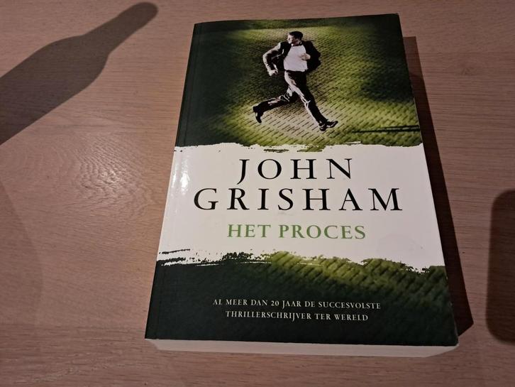 John Grisham - Het proces, Boeken, Thrillers, Zo goed als nieuw, Ophalen of Verzenden