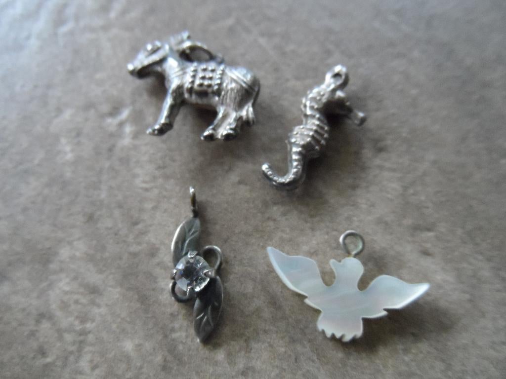 Kettinghangers., Ophalen of Verzenden, Zo goed als nieuw, Zilver, Overige materialen