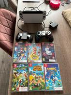 Nintendo Switch OLED met 7 spellen en extra controllers, Spelcomputers en Games, Games | Nintendo Switch, Overige genres, Eén computer