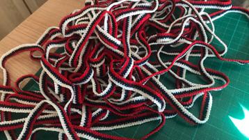 Sierband rood wit blauw minimaal 14 meter   (Ee) beschikbaar voor biedingen
