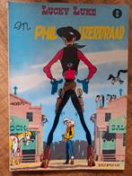 Lucky Luke 8 - en Phil IJzerdraad, Eén stripboek, Ophalen of Verzenden, Gelezen, Morris