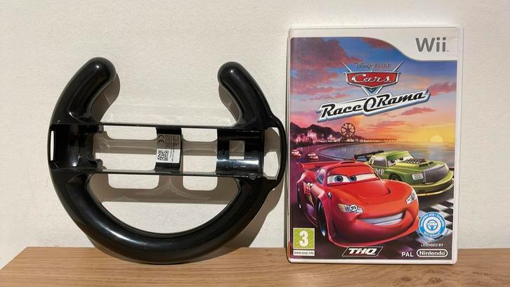 Disney cars race o Rama compleet met handleiding en stuurtje, Spelcomputers en Games, Games | Nintendo Wii, Zo goed als nieuw
