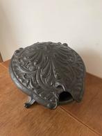 Antieke gietijzeren kolenkit, Ophalen