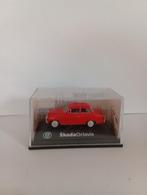 Abrex Skoda Octavia, rood kleurig en nog in de doos, Hobby en Vrije tijd, Modelauto's | 1:87, Ophalen of Verzenden, Zo goed als nieuw