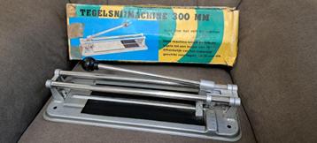 te koop licht grijze tegel snijder 300 mm nog niet gebruik beschikbaar voor biedingen