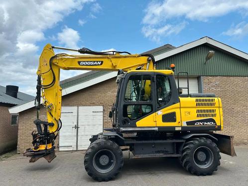 Doosan DX140W-5 (bj 2016), Zakelijke goederen, Machines en Bouw | Kranen en Graafmachines, Graafmachine