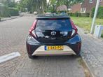 Toyota Aygo X 1.0 Vvt-i MT 72pk 2024 automaat, Beige bj 2024, Auto's, Toyota, Stof, 4 stoelen, Beige, Origineel Nederlands
