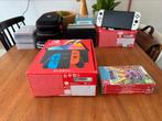 Switch OLED met 4 games!, Switch OLED, Met games, Ophalen of Verzenden, Zo goed als nieuw