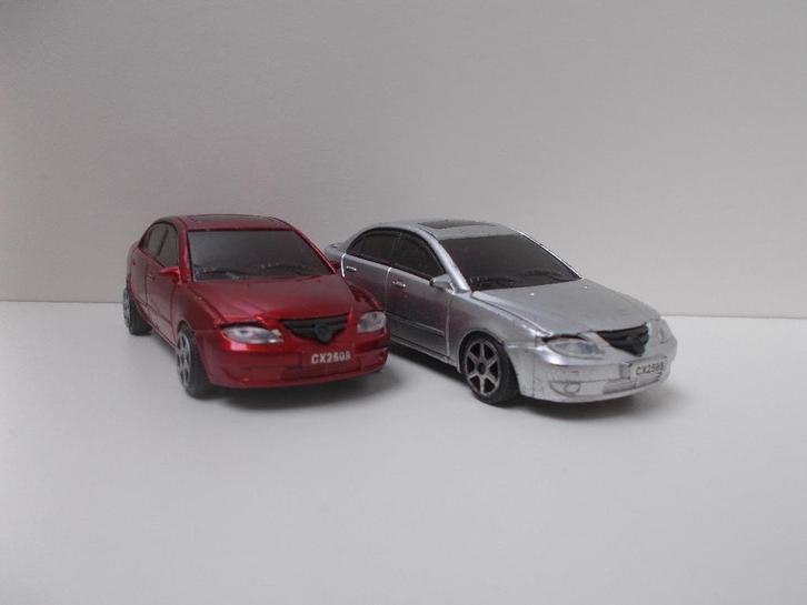 2x Haima 3 CX | Mazda 323 | 1:43, Hobby en Vrije tijd, Modelauto's | 1:43, Gebruikt, Auto, Overige merken, Ophalen of Verzenden