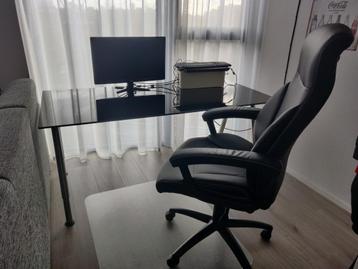Luxe zwarte lederen bureaustoel beschikbaar voor biedingen