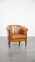 Subtiele schapenleren clubfauteuil met een tijdloos design, Huis en Inrichting, Fauteuils, Ophalen, Gebruikt, ., Vintage