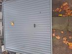 Nieuwe garagedeur  grijs, Doe-het-zelf en Verbouw, Rolluiken, Ophalen, 200 cm of meer, Zo goed als nieuw, 200 cm of meer