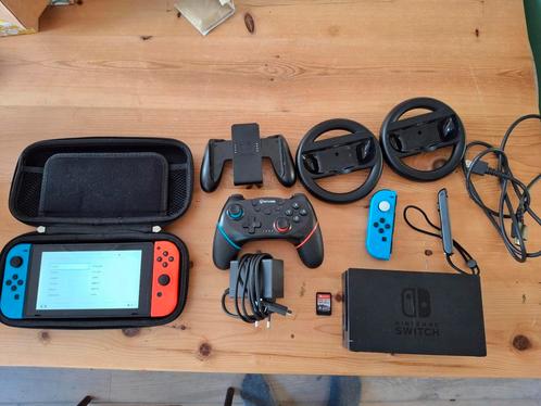 Nintendo switch+accessoires +controllers+game+nieuwe accu, Spelcomputers en Games, Spelcomputers | Nintendo Switch, Zo goed als nieuw