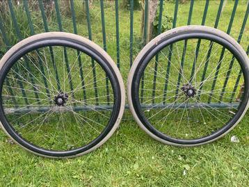 2 velgen met Assen voor afneembare wielen van rolstoel roxx  beschikbaar voor biedingen