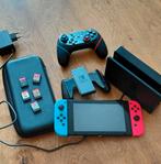 Nintendo Switch + controller + laadstation + 5 spellen, Spelcomputers en Games, Spelcomputers | Nintendo Switch, Ophalen of Verzenden