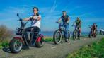 20% korting tour e-chopper/e-tuk tuk/e-steps Bollenstreek, Drie personen of meer, Kortingskaart