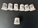 7 Porseleinen Vingerhoedjes, Bloemen en een Vink, Verzamelen, Vingerhoedjes, Ophalen of Verzenden, Gebruikt, Porselein, Nederland