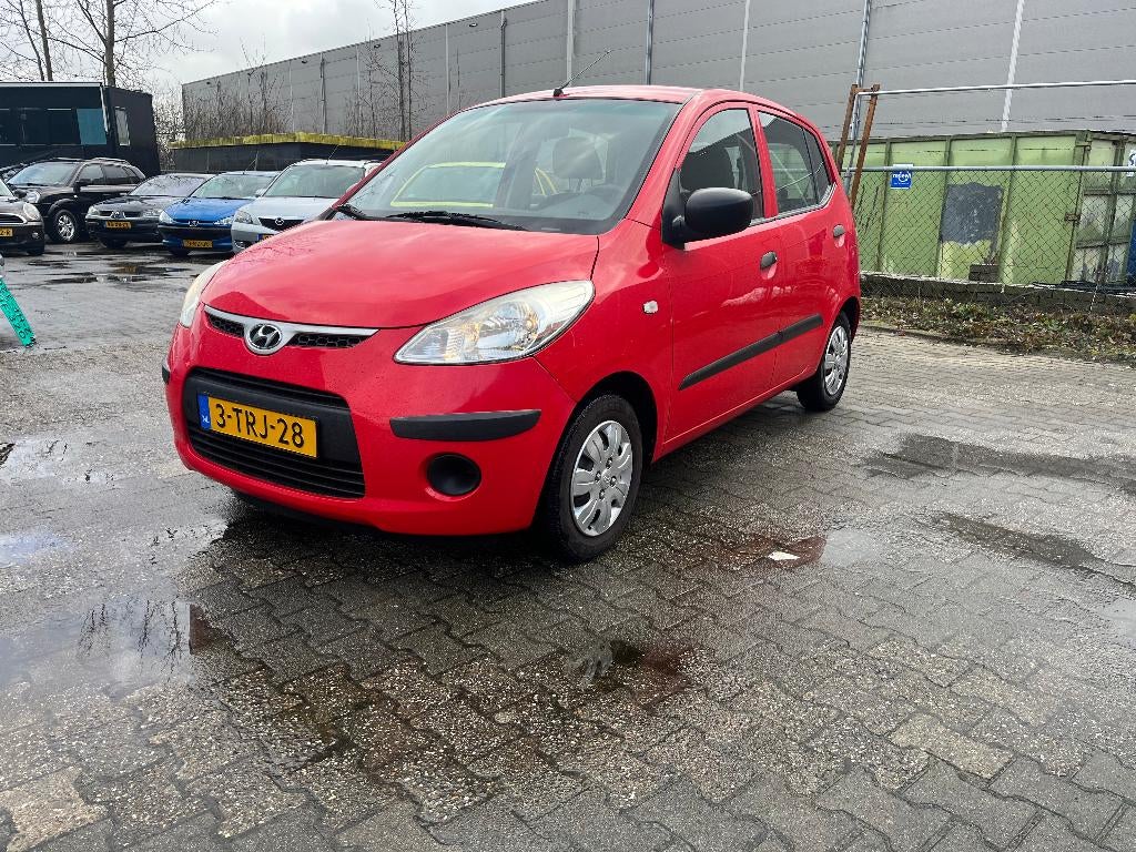 Hyundai i10 1.1 I 5DR 2009 Rood, Auto's, Hyundai, Voorwielaandrijving, Stof, 31 €/maand, 4 cilinders