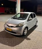 Toyota Aygo 1.0 12V Vvt-i 5DRS 2007 Grijs, Te koop, Zilver of Grijs, Geïmporteerd, Benzine