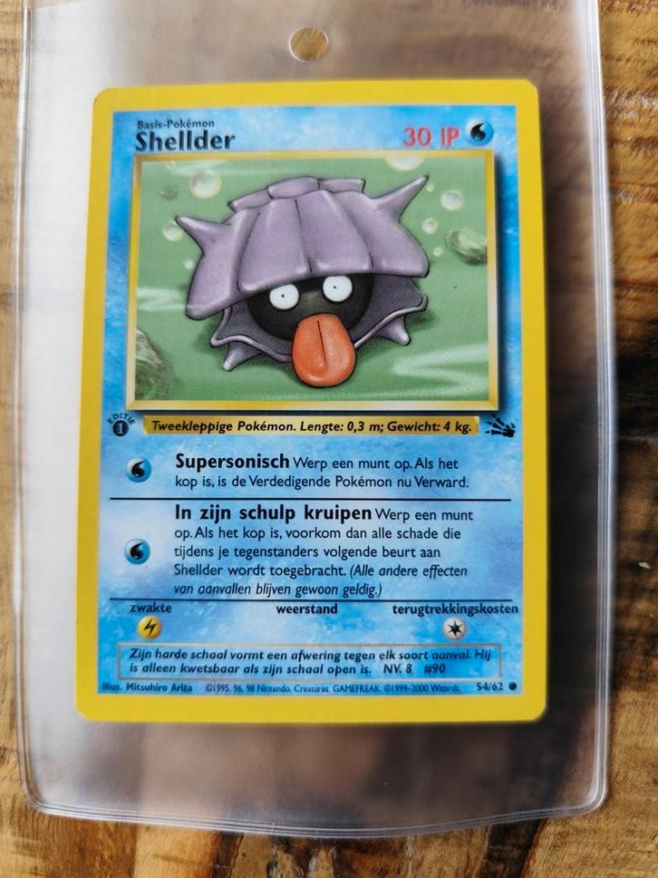 1e Editie Shelder Fossil Pokemonkaart - Mint, Hobby en Vrije tijd, Verzamelkaartspellen | Pokémon, Nieuw, Losse kaart, Ophalen of Verzenden