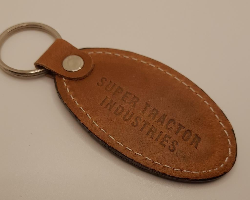 Leren sleutelhanger 'Super Tractor Industries', Ophalen of Verzenden