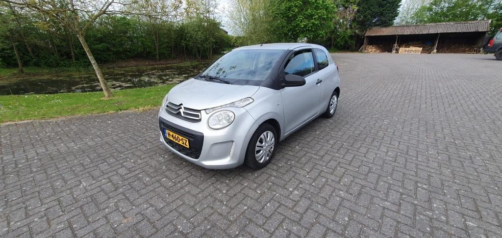 Citroën C1 1.0 E-vti 68 3-DRS 2015 Grijs, Auto's, Voorwielaandrijving, Stof, Zwart, 4 stoelen