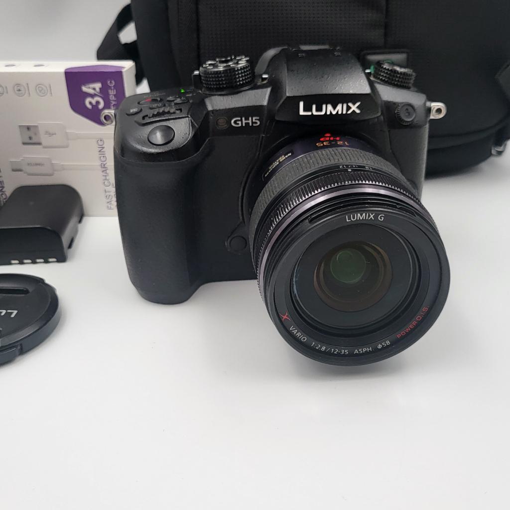 Panasonic Lumix DC-GH5 + Vario 12-35mm + 6 Accu, Audio, Tv en Foto, Fotocamera's Digitaal, Panasonic, Gebruikt, Support@panasonic.com