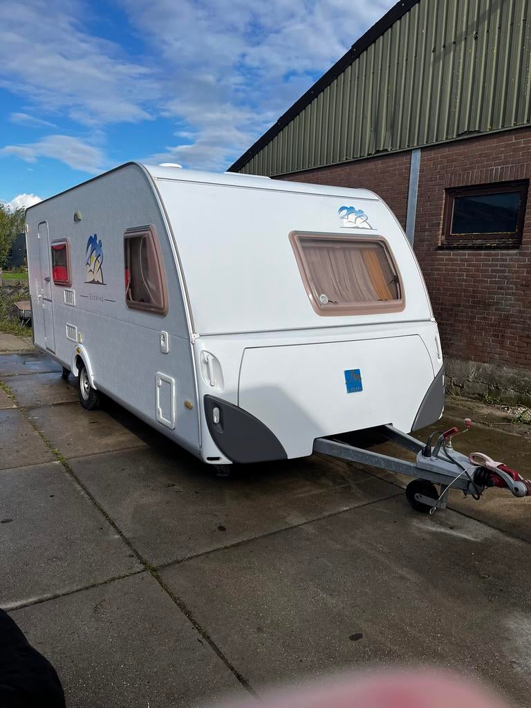 KNAUS SUNWIND 550 met stapelbed voor 3 kinderen en Frans bed, Rondzit, Schokbreker, Particulier, 6 tot 7 meter