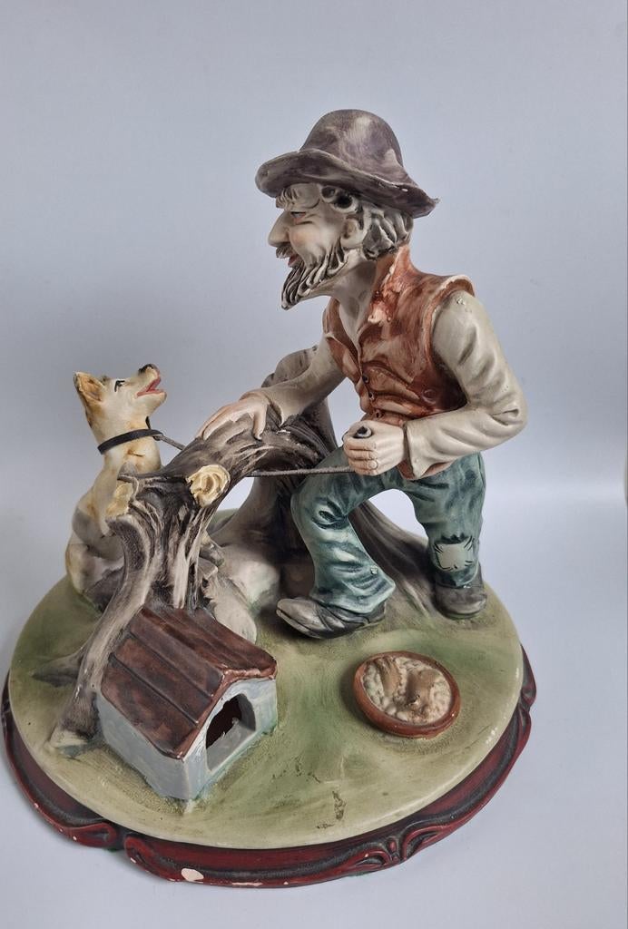 Vintage porseleinen beeld van man met hond., Ophalen of Verzenden, Zo goed als nieuw