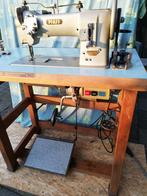 Pfaff industriële naaimachine., Ophalen