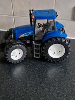 Bruder Tractor New Holland grote Trekker, Kinderen en Baby's, Speelgoed | Speelgoedvoertuigen, Ophalen of Verzenden