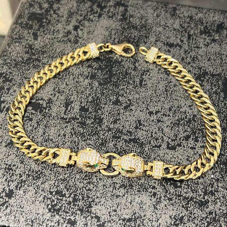 14 karaats gouden armband panter model cuban, Sieraden, Tassen en Uiterlijk, Armbanden, Zo goed als nieuw, Zilver, Goud, Ophalen of Verzenden