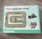 Vloerpuzzel met treinbaan, Ophalen, 2 tot 4 jaar, 10 tot 50 stukjes, Zo goed als nieuw