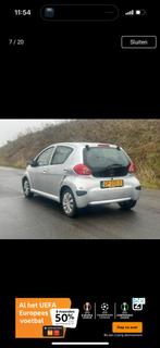 Toyota Aygo 1.0 12V Vvt-i 5DRS 2007 Grijs, Auto's, Toyota, Voorwielaandrijving, 4 stoelen, 68 pk, Bedrijf