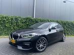 BMW 1-serie 118i High Executive M-Pakket | Virtual Dash |LED, 65 €/maand, 4 cilinders, Leder en Stof, Zwart