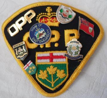 Mouwembleem Ontario Provincial Police + 7 verschillende pins beschikbaar voor biedingen