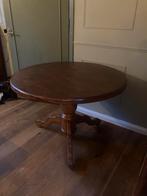 Ronde houten eettafel, Ophalen