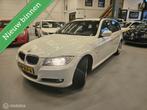 BMW 3-serie Touring 318i Executive (2009), Auto's, Achterwielaandrijving, Huisgarantie, Met garantie (alle), Wit