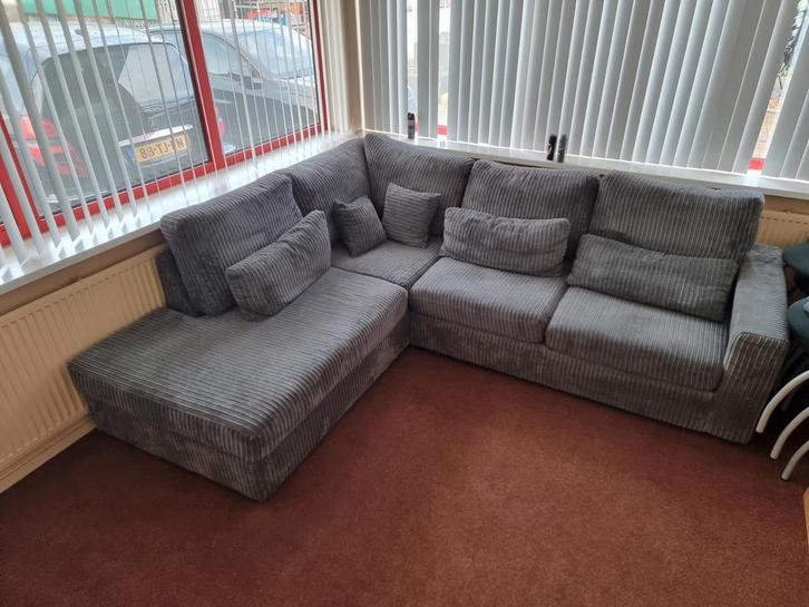 Mooie grijze hoekbank te koop!, Huis en Inrichting, Banken | Bankstellen, Gebruikt, Vierpersoons of meer, Ophalen of Verzenden