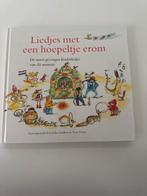 Liedjes met een hoepeltje erom - Kinderboek, Ophalen of Verzenden, Zo goed als nieuw, 2 tot 3 jaar