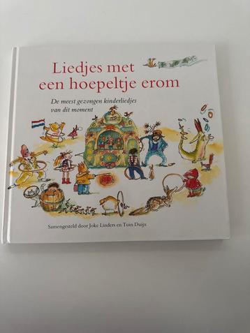 Liedjes met een hoepeltje erom - Kinderboek beschikbaar voor biedingen