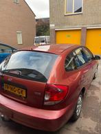Kia Rio 1.3 I 8V HB 2003 Bruin, nieuw apk!, Auto's, Voorwielaandrijving, 4 cilinders, Bruin, 1343 cc
