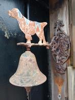 Antieke bel met hond, Ophalen