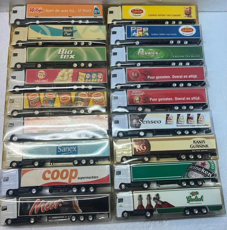1:87 , 18 x DAF 95 XF / oplegger met verschillende reclame., Hobby en Vrije tijd, Modelauto's | 1:87, Zo goed als nieuw, Bus of Vrachtwagen