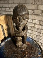 Houten beeldje in goede staat, Ophalen