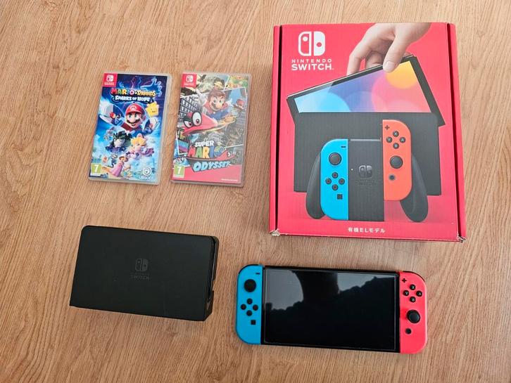 Nintendo switch oled met games, Spelcomputers en Games, Spelcomputers | Nintendo Switch, Zo goed als nieuw, Switch OLED, Met games