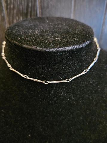 Zilverkleurige Enkelband beschikbaar voor biedingen