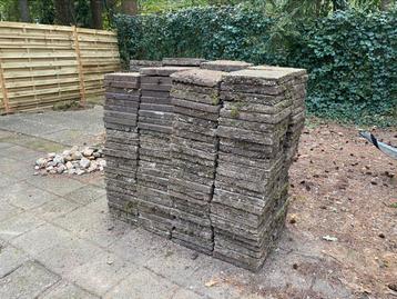 Gratis stoeptegels beschikbaar voor biedingen